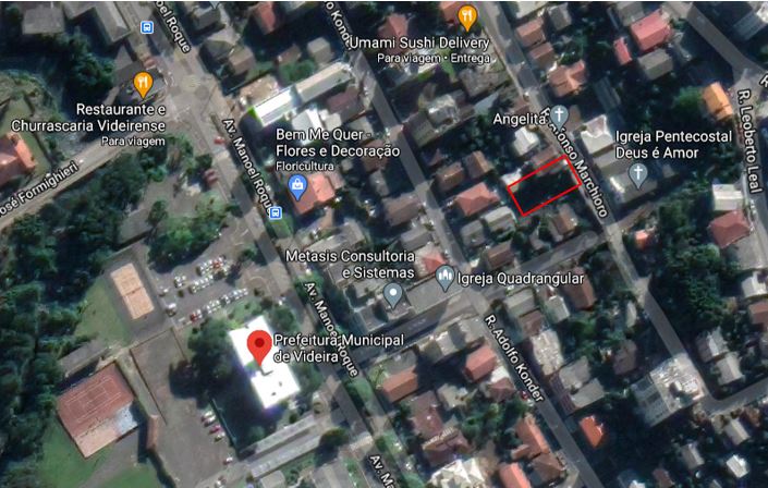 Lote com área de 351,00 m², sendo 13,00 m de frente, localizado na Rua Afonso Marchioro, próximo à Prefeitura Municipal.
